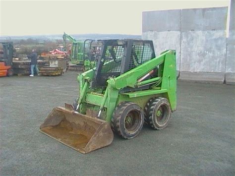 location of òil filter on gehl 3825 skid steer|gehl 3825 skid steer specs.